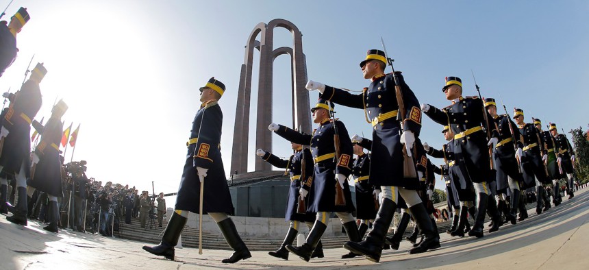 Soldiers march during celebrations marking the Army Day in Bucharest, capital of Romania, Oct. 25, 2022.