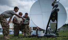 In this 2017 photo, U.S. Air Force communications technicians establish network connectivity for the Air Force Special Operations Command Air Rapid Response Kit (ARRK) at Kadena Air Base, Japan. 