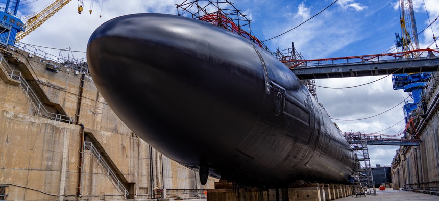 The attack submarine Topeka undocks—on time—after work at Pearl Harbor Naval Shipyard & Intermediate Maintenance Facility on July 27, 2021.