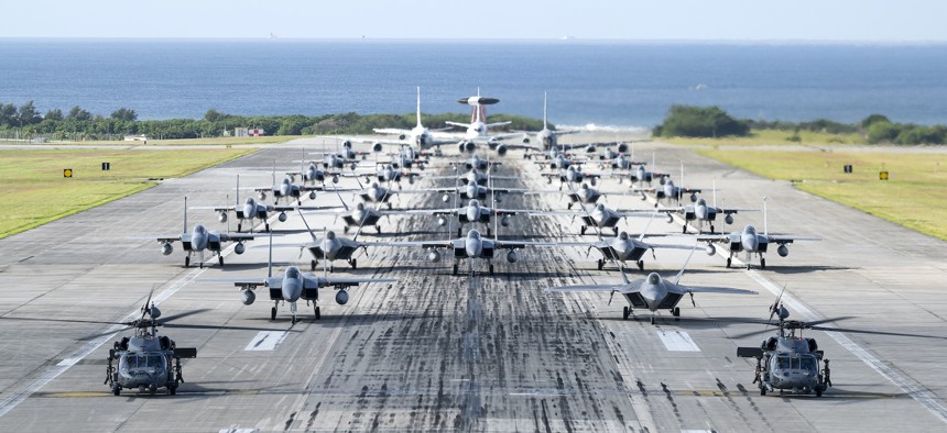 U.S. Air Force aircraft line up on the runway during a capabilities demonstration at Kadena Air Base, Japan, Nov. 22, 2022. 