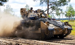 An M2A3 Bradley Fighting Vehicle advances during a live-fire exercise as part of DEFENDER-Europe 22 in Germany, May 24, 2022. 