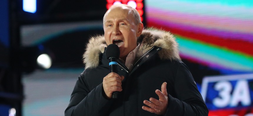 MOSCOW, RUSSIA - MARCH 18: (RUSSIA OUT) Russian President Vladimir Putin attends a rally of his supporters at Manezhnaya Square near the Moscow's Kremlin, Russia, March 18, 2018. Vladimir Putin has won the 2018 Presidential Elections.