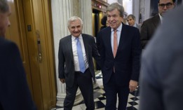 Sen. Jack Reed, D-RI, left, and Sen. Roy Blunt, R-MO, head for the Senate Chamber for a procedural vote on the 2023 omnibus spending legislation at the U.S. Capitol on December 20, 2022.