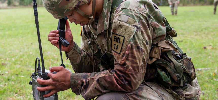 Army communications would get a boost in the 2023 omnibus spending bill. Here, a soldier makes a medical evacuation radio call during the Georgia National Guard Best Warrior Competition at Fort Stewart, Ga., March 22, 2022.