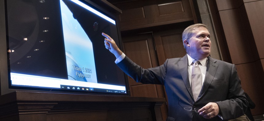 U.S. Deputy Director of Naval Intelligence Scott Bray explains a video of unidentified aerial phenomena, as he testifies before a House Intelligence Committee subcommittee hearing at the U.S. Capitol on May 17, 2022 in Washington, DC. 