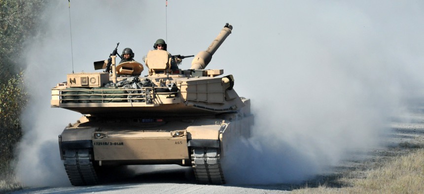 U.S. Army soldiers of Alpha Company, 3rd Battalion 66th Armor Regiment, Task Force 1-2, 172nd Infantry Brigade are conducting a live fire training exercise, using M1 Abrams tanks on Range 132 at Grafenwoehr Training Area, Germany, Oct. 13, 2010.