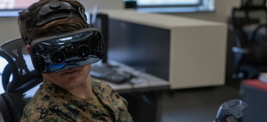 U.S. Marine Corps Sgt. Mason Whatley, a radio operator with 1st Air Naval Gunfire Liaison Company, I Marine Expeditionary Force Information Group, uses a Varjo XR-3 mixed reality headset during 1st ANGLICO certification exercise 2-23 at Marine Corps Base Camp Pendleton, California, Jan. 11, 2023.