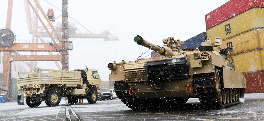 A U.S. Army M1A2 Abrams tank arrives for European exercises at at the Baltic Container Terminal in Gdynia, Poland, on December 3, 2022.