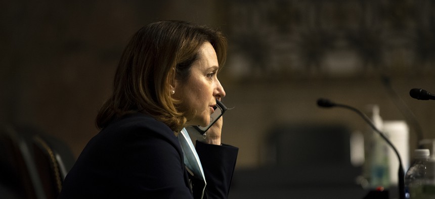 Kathleen Hicks takes a phone call from a senator shortly before her Senate confirmation hearing for Deputy Secretary of Defense in Washington, D.C. Feb. 2, 2021.