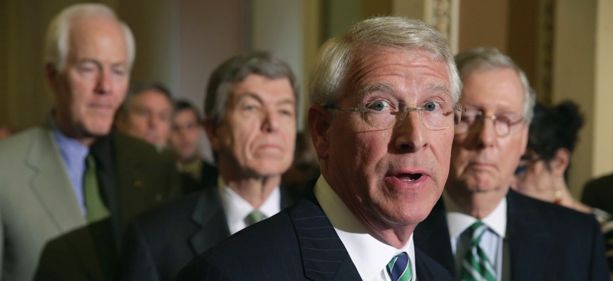 : Sen. Roger Wicker (R-MS) talks to reporters following the weekly Senate Republican policy luncheon at the U.S. Capitol March 17, 2015 