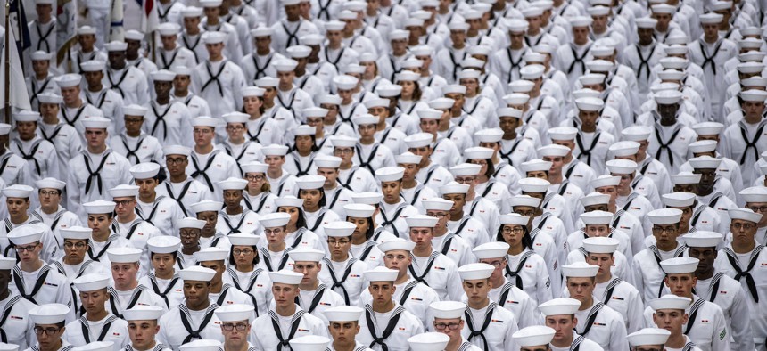 Graduating recruits stand in formation at the U.S. Navy's Recruit Training Command in 2019.