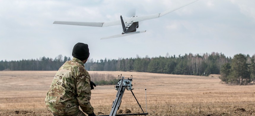 Army Pvt. Jonathan Jackson launches a Puma aviation system during a multinational joint equipment training brief on April 2, 2018, in Grafenwoehr, Germany. The Army is looking to test new Robotic and Autonomous Systems this summer, according to a recent RFI.