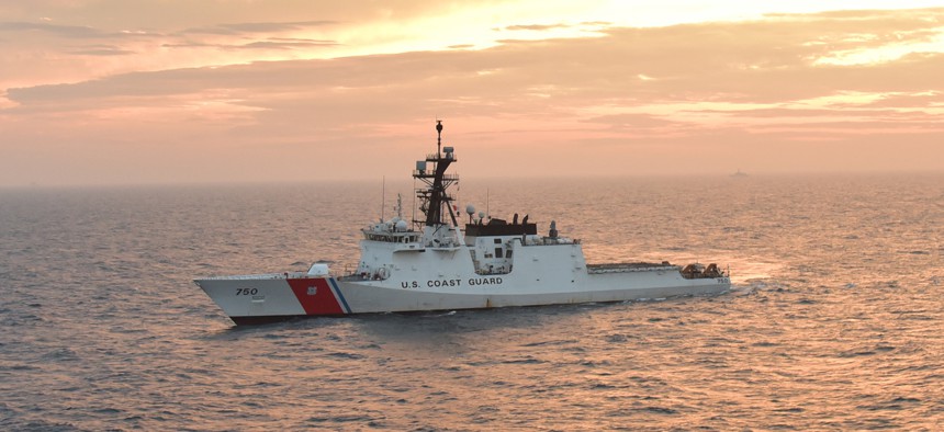 U.S. Coast Guard Cutter Bertholf (WMSL 750) basks in a sunset glow in the Yellow Sea during a 2019 deployment.