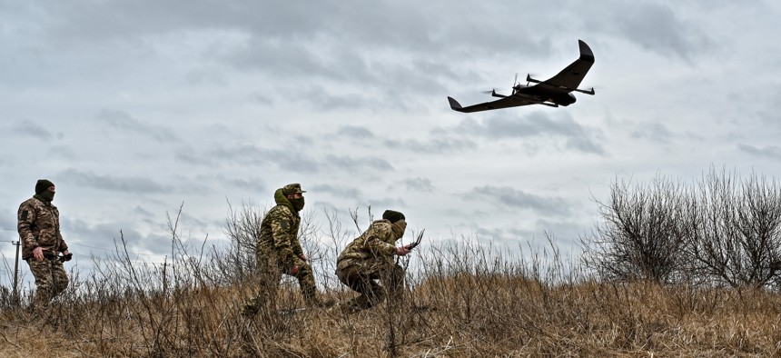 Ukrainian soldiers try out a drone in Zaporizhzhia in southeastern Ukraine on February 15.
