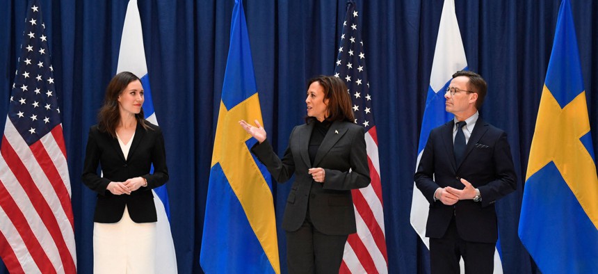 Finland's Prime Minister Sanna Marin (left), U.S. Vice President Kamala Harris, and Sweden's Prime Minister Ulf Kristersson pose for photographers at the Munich Security Conference (MSC) in Munich, southern Germany, on February 18, 2023.