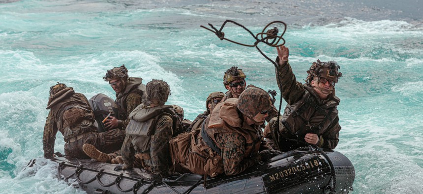 U.S. Marines with the 31st Marine Expeditionary Unit prepare to return to the amphibious transport dock ship USS Green Bay (LPD-20) after an exercise with soldiers from the Japan Ground Self-Defense Force at Tokunoshima, Japan, on March 3, 2023. 