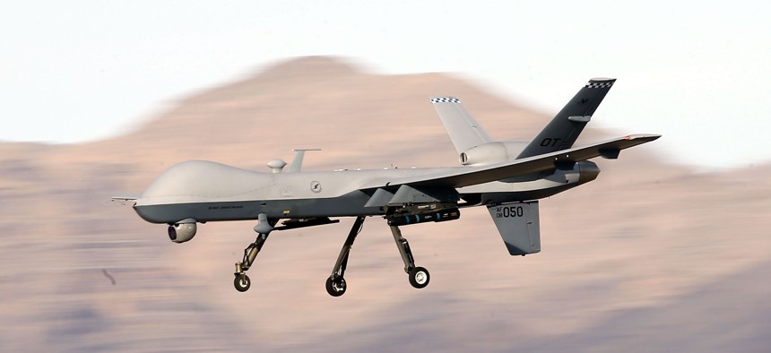 In this 2015 photo, an MQ-9 Reaper flies during a training mission at Creech Air Force Base, Nevada.