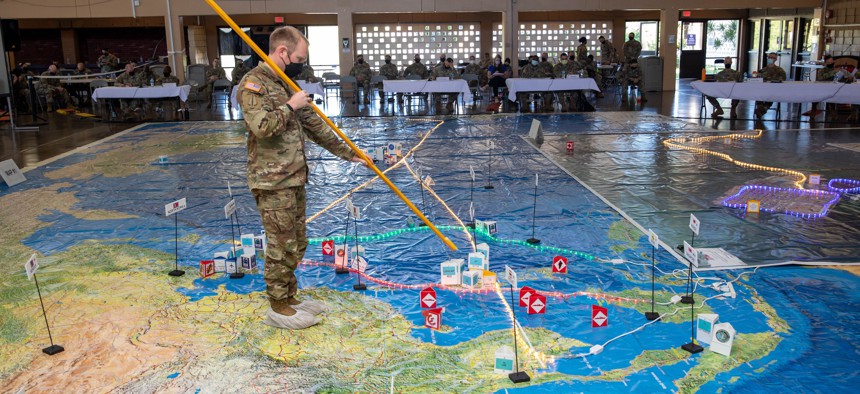 In February 2022, 8th Theater Sustainment Command planners at Pearl Harbor, Hawaii, used a floor map to display Army prepositioned stocks and other elements participating in Pacific Pathways 2022. 