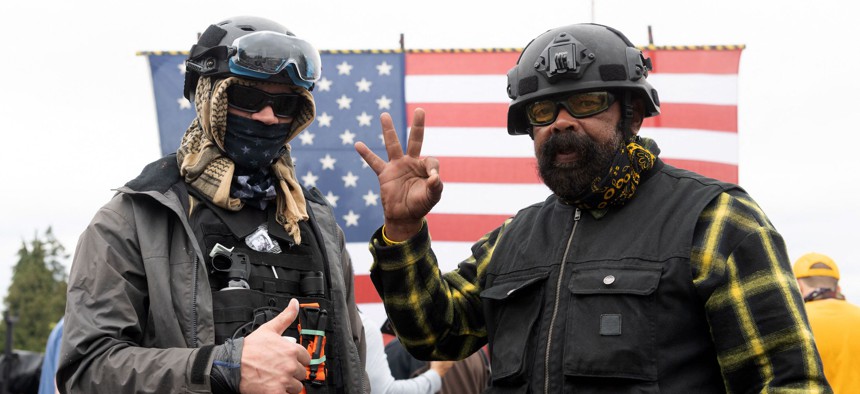Members of the Proud Boys pose for a photograph during a far-right rally on August 22, 2021 in Portland, Oregon. 