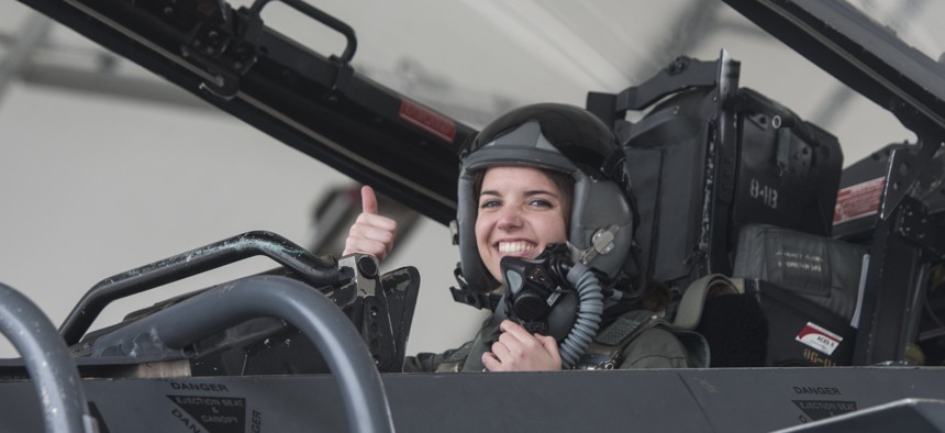 In this 2019 photo, Joy Duer, a Duke University senior who took the Hacking for Defense course, prepares for a backseat ride in a F-15E at  Seymour Johnson Air Force Base, N.C.