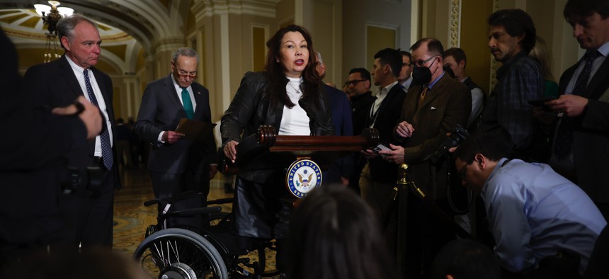 Sen. Tammy Duckworth, D-Illinois, an Iraq war veteran who was injured when the helicopter she was piloting was shot down in 2004, is among the senators seeking to repeal decades-old military-force authorizations.