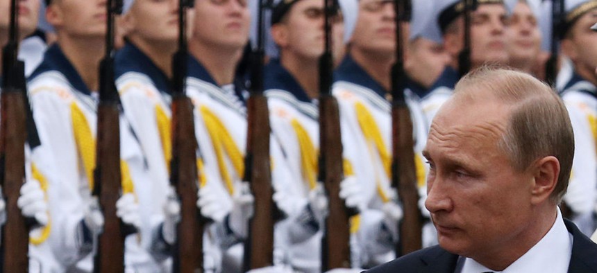 NOVOROSSIYSK, RUSSIA - SEPTEMBER 23: Russian President Vladimir Putin visits the destroyer Vice-Admiral Kulakov at the Naval Base of Black Sea Fleet on September 23, 2014 in Novorossiysk,