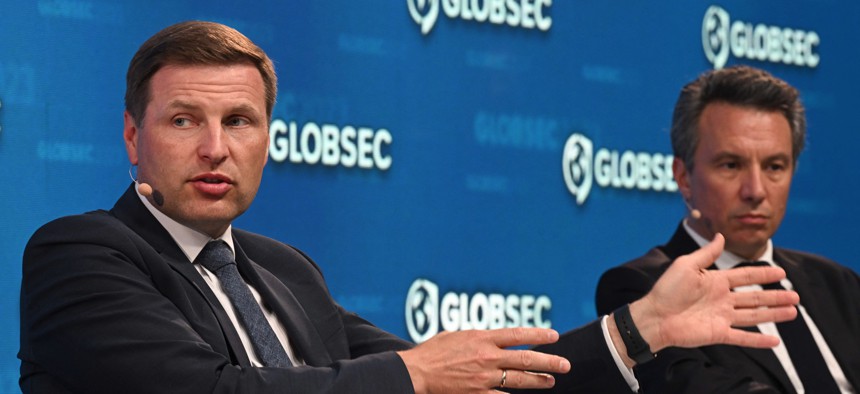 Estonian Defense Minister Hanno Pevkur, left, and Camille Grand of the European Council on Foreign Relations speal at GLOBSEC 2023 Bratislava Forum in Bratislava, Slovakia, on May 29, 2023.