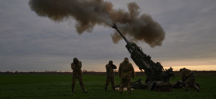 An Ukrainian artillery unit fires a U.S.-provided M777 cannon in January 2023 in Kherson, Ukraine. Some U.S. Army M777s required unexpected maintenance work before they could be delivered.