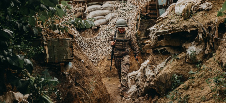 Ukrainian Soldier Mykhailo walks in the trenches in the front-line positions near Toresk, in Donetsk region, Ukraine on June 27, 2023. 