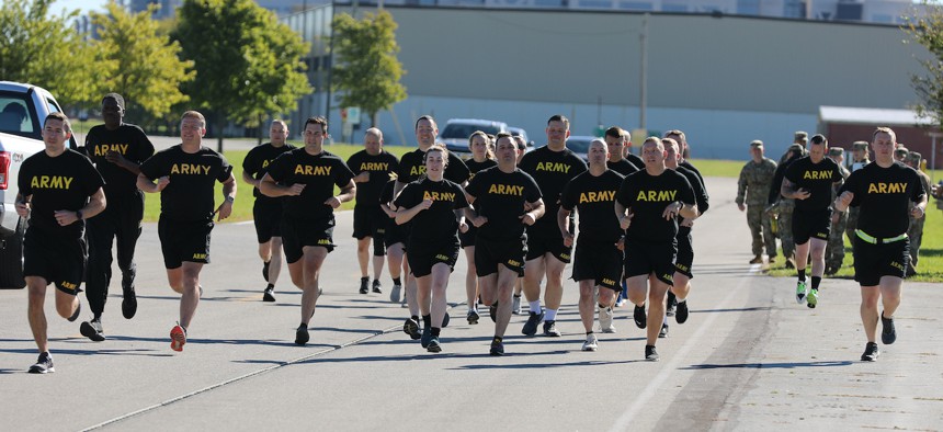 U.S. Army Soldiers assigned to the 37th Infantry Brigade Combat Team conduct the 2-Mile Run event of the Army Combat Fitness Test at the Defense Supply Center Columbus, Ohio, Sep. 23, 2022.