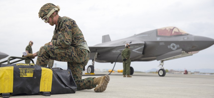 Marines with Marine Fighter Attack Squadron 242 and Marine Wing Support Squadron 171 refuel an F-35B during a Forward Arming and Refueling Point training at Marine Corps Air Station Iwakuni, Japan, April 5, 2023.