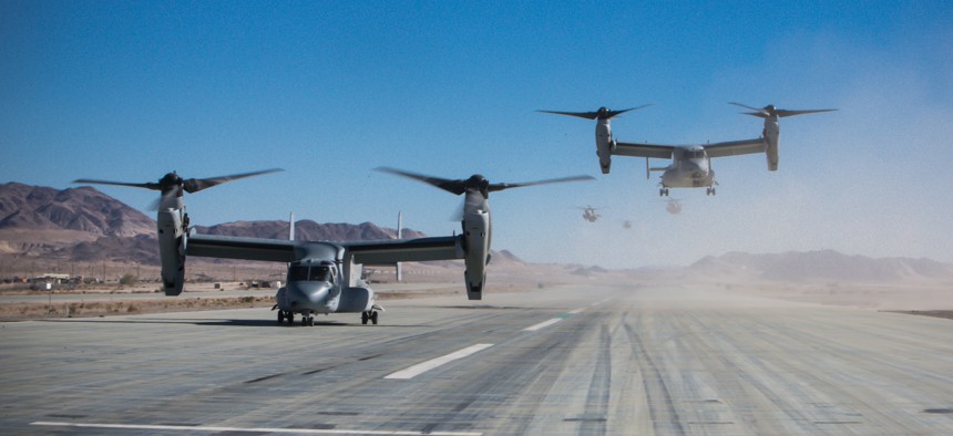 In this 2017 photo, MV-22B Ospreys with Marine Medium Tiltrotor Squadron 364 return from a flight mission in support of an exercise. 