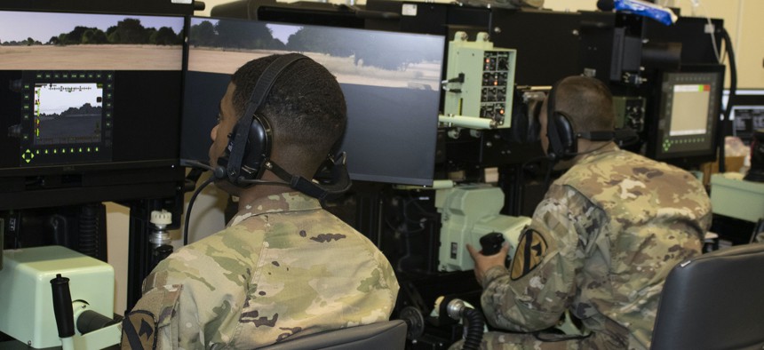 Soliders take part in the Synthetic Training Environment - Information System (STE-IS) Soldier Touch Point 2B in Orlando, Fla., in March 2022. 