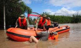 Rescue teams work in Harbin on August 5, 2023, after Typhoon Doksuri brought flooding to China's Heilongjiang Province.