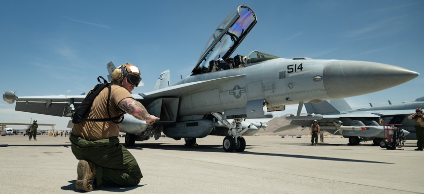 U.S. Navy Aviation Structural Mechanic Petty Officer 3rd Class Tyler Ritchie assigned to the Electronic Attack Squadron (VAQ) 138, Naval Air Station Whidbey Island, Washington, prepares an EA-18G Growler for a Red Flag 23-3 mission at Nellis Air Force Base, Nevada, July 18, 2023. 
