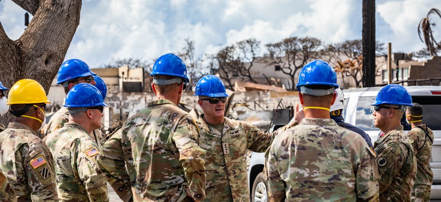 U.S. Army Gen. Charles A. Flynn, commanding general of the U.S. Army Pacific, alongside the command element of the Combined Joint Task Force 50 (CJTF-50) meets with search, rescue and recovery personnel in Lahaina, Maui, Aug. 15, 2023.