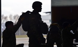 U.S. Special Operations Forces soldiers assigned to 10th Special Forces Group (Airborne) perform safety inspections in preparation for an airborne operations training exercise, February 22, 2019.