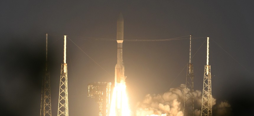 In this 2020 photo, a United Launch Alliance Atlas V rocket carrying a classified payload for the National Reconnaissance Office lifts off from Cape Canaveral Air Force Station, Fla. 