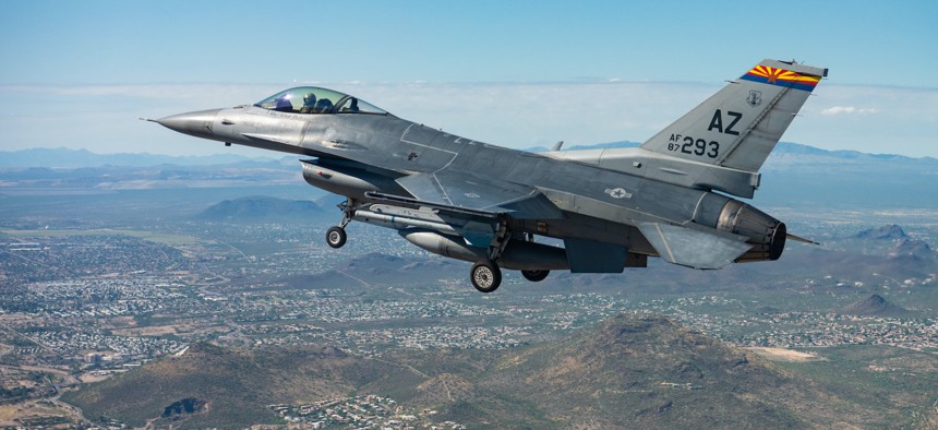 An F-16 assigned to the 162nd Wing, Morris Air National Guard Base, flies over Tucson, Arizona. 