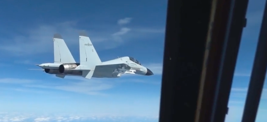 On Dec. 21, 2022, a People’s Liberation Army Navy J-11 fighter flew within 20 feet of a U.S. Air Force RC-135 aircraft in international airspace over the South China Sea, U.S. officials said.