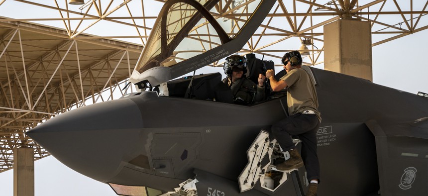 U.S. Air Force Capt. Joseph Gould, 421st Expeditionary Fighter Squadron F-35A Lightning II pilot, greets an airman from the 421st Expeditionary Maintenance Group after landing at Al Udeid Air Base, Qatar, Sept. 5, 2023. 