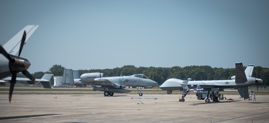 Dual remote-piloted MQ-9 Reapers and dual A-10 Thunderbolts at Battle Creek Air National Guard Base, Michigan, on Aug. 4.