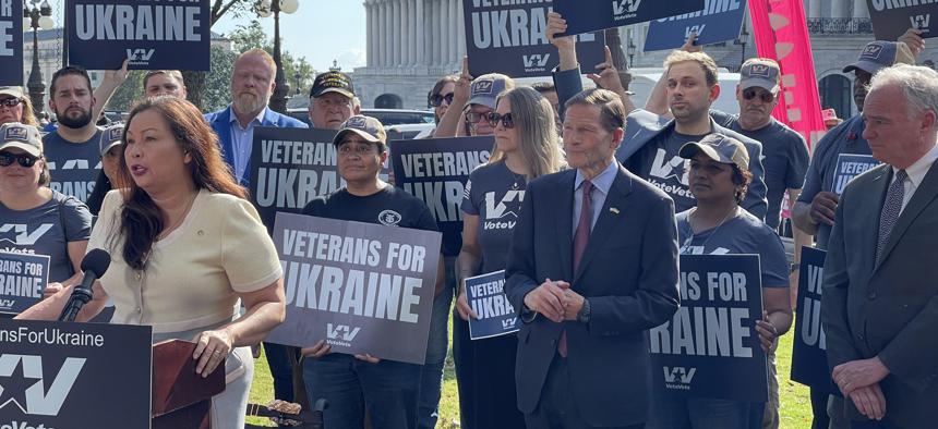Sens. Tammy Duckworth, Richard Blumenthal, and Tim Kaine, all Democrats, rally for Ukraine aid on Capitol Hill on Oct. 3, 2023. 