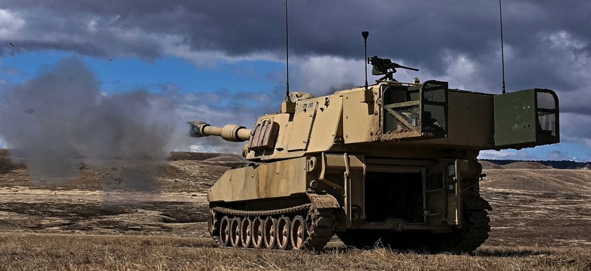 A U.S. Army M109A6 Paladin assigned to 3rd Battalion, 29th Field Artillery Regiment, 3rd Armored Brigade Combat Team, 4th Infantry Division fires during an artillery direct fire range at Fort Carson, Colorado, April 28, 2023. 