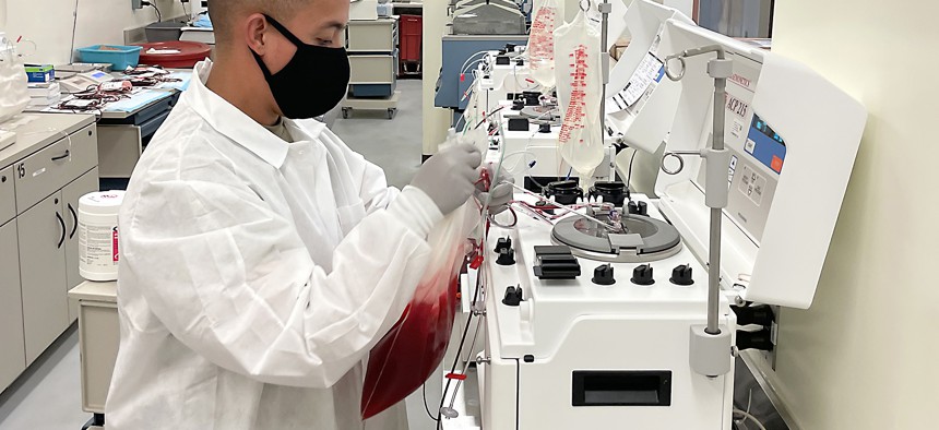 Members of the 95th Medical Detachment (Blood Support) perform deglycerolization and blood washing quality control checks in 2021 at Camp Humphreys, South Korea.