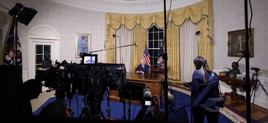 U.S. President Joe Biden addresses the nation from the Oval Office of the White House on October 19, 2023.