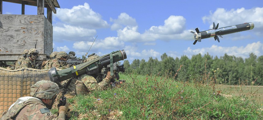 A U.S. Army paratrooper fires an FGM-148 Javelin shoulder-fired, anti-tank missile during a combined arms live-fire exercise at Grafenwoehr Training Area, Germany, August 21, 2019. 