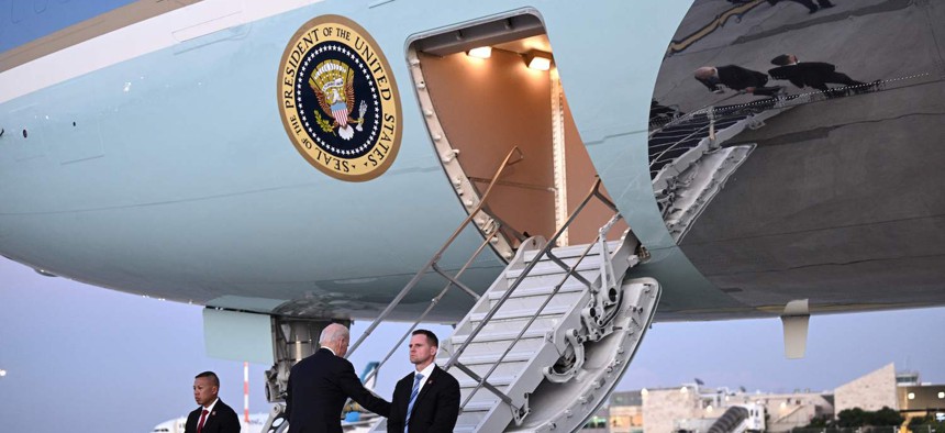 President Joe Biden boards Air Force One at Ben Gurion International Airport following a visit to Israel, on October 18, 2023.