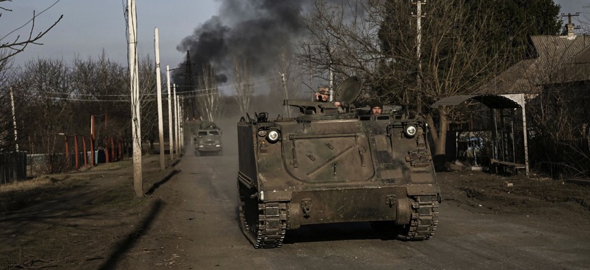 Ukrainian servicemen drive a M113 armored personnel carrier away from Bakhmut on March 20, 2023. Ukraine has been given M113s by the United States and Spain, but has also purchased them from Belgium and elsewhere.