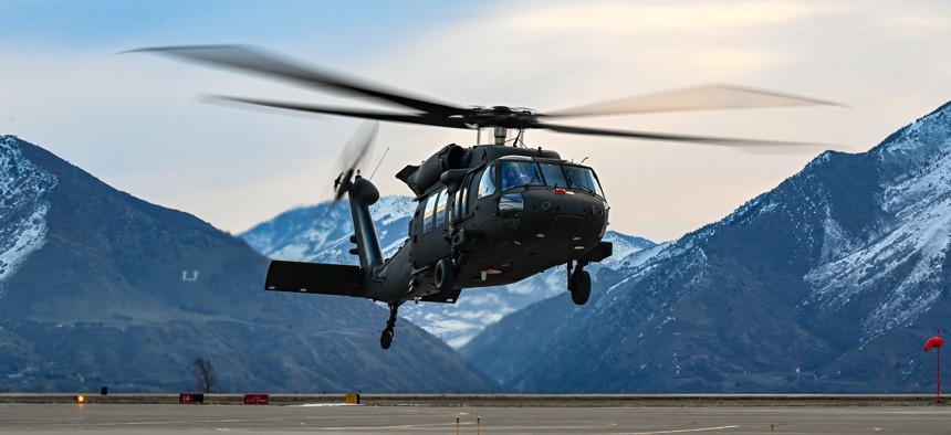 An UH-60 Blackhawk hovers above the airfield during a series of 5G avionics tests March 2, 2022, at Hill Air Force Base, Utah. 
